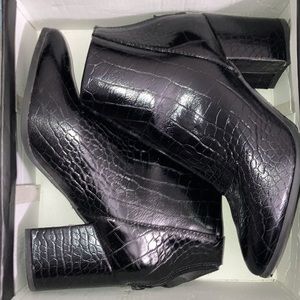 Fairly new black leather booties.